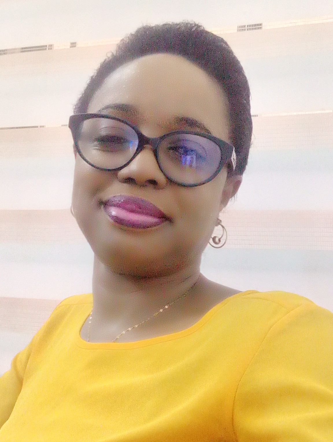 A professional headshot of Lilian Aisuan, AI Solutions Architect