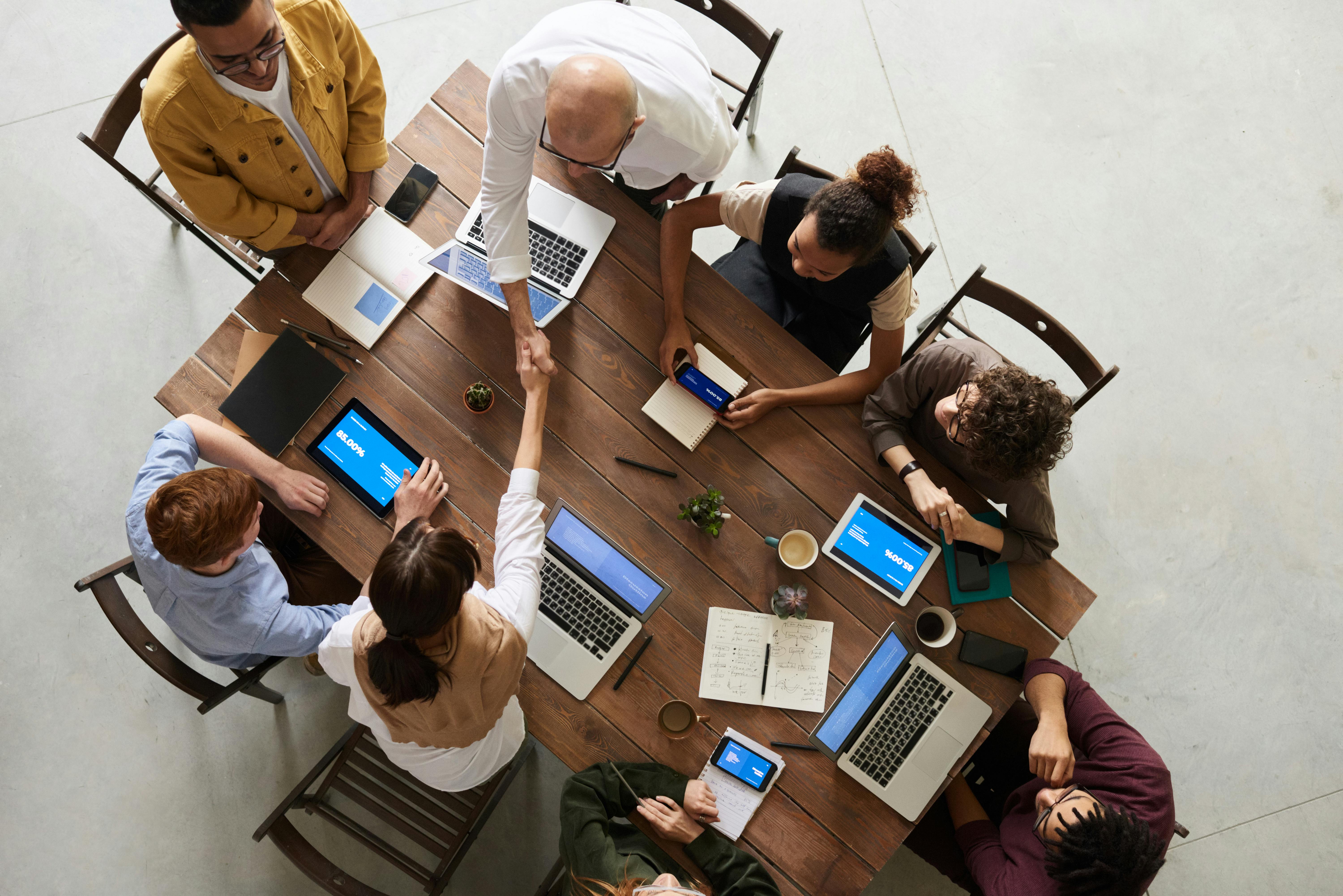 A diverse team collaborating during a technical workshop
